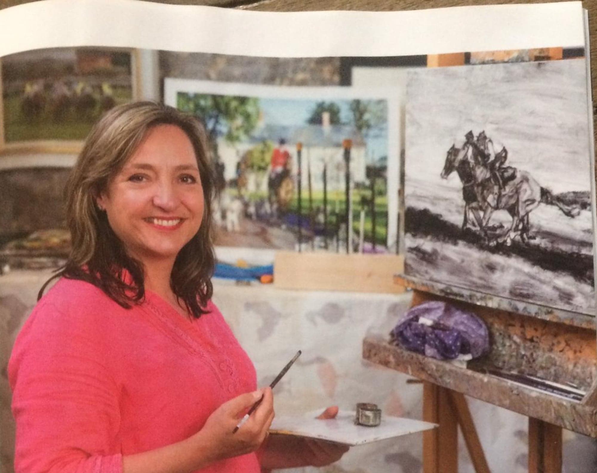 Katie Scorgie at her easel, photographed for Country Life